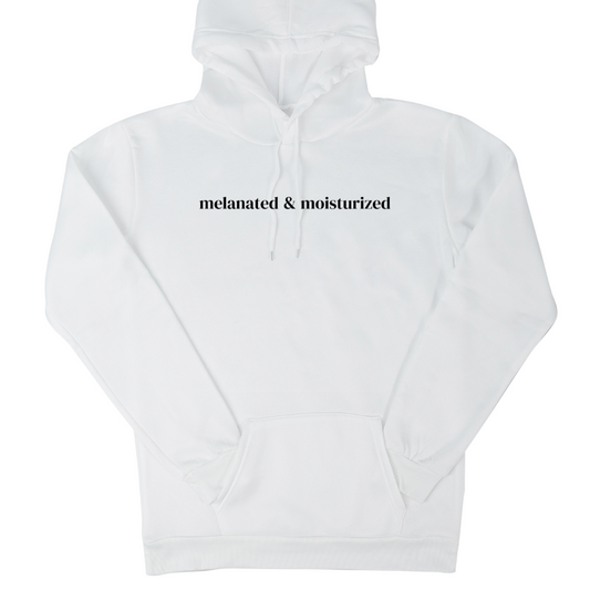 Digital mockup of a white hooded sweatshirt with 'Melanated & Moisturized' written in the middle in black.